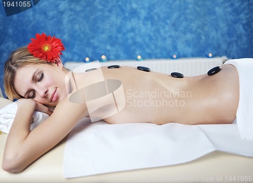 Image of Beautiful young woman in spa