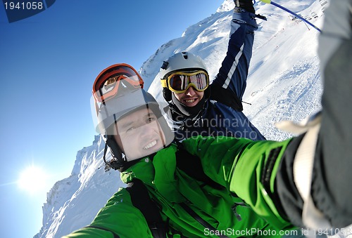 Image of winter portrait of friends at skiing