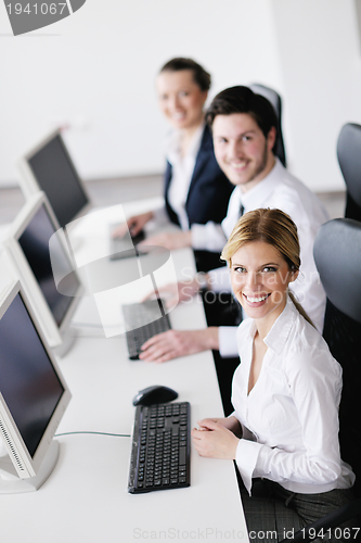 Image of business people group working in customer and help desk office