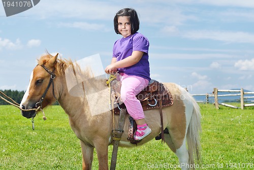 Image of child ride pony