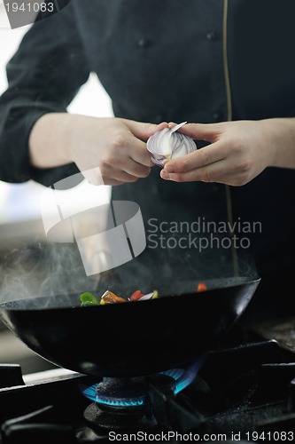 Image of chef preparing meal
