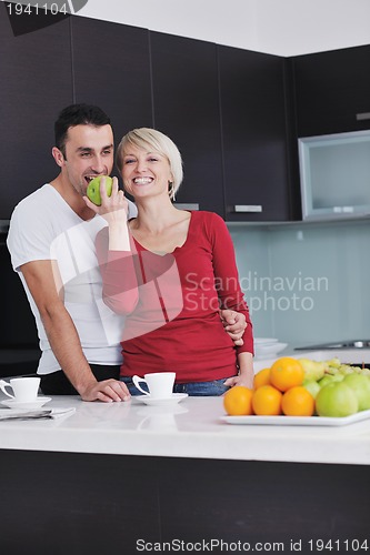 Image of young couple have fun in modern kitchen
