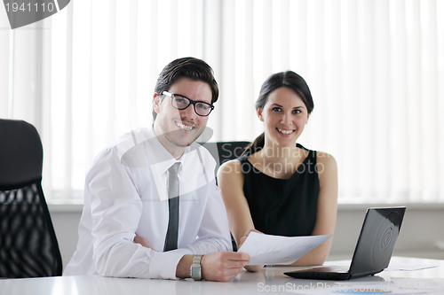 Image of business people in a meeting at office