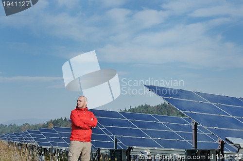 Image of Male solar panel engineer at work place