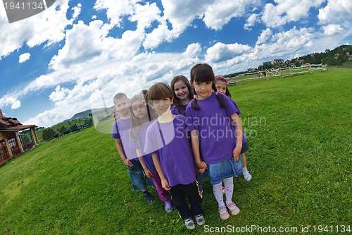 Image of happy kids group  have fun in nature