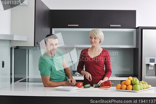 Image of young couple have fun in modern kitchen