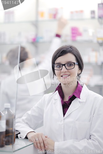 Image of team of pharmacist chemist woman  in pharmacy drugstore