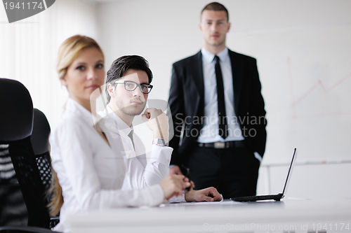 Image of business people in a meeting at office