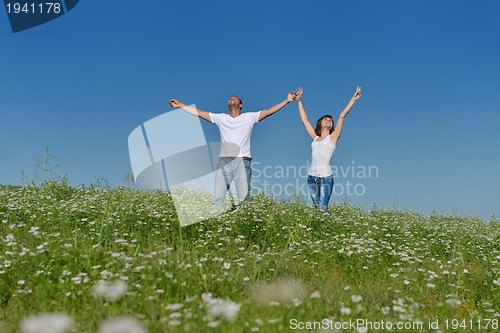 Image of happy couple in wheat field