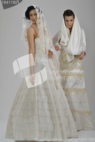 Image of portrait of a three beautiful woman in wedding dress