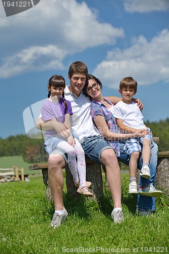 Image of happy young family have fun outdoors