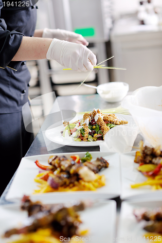 Image of chef preparing meal