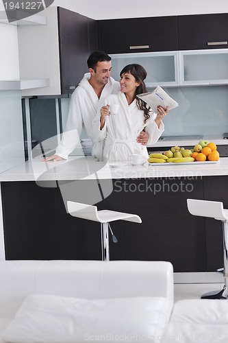 Image of young couple have fun in modern kitchen