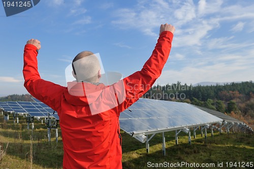 Image of Male solar panel engineer at work place