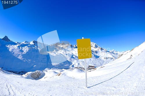 Image of Sign board at High mountains under snow in the winter