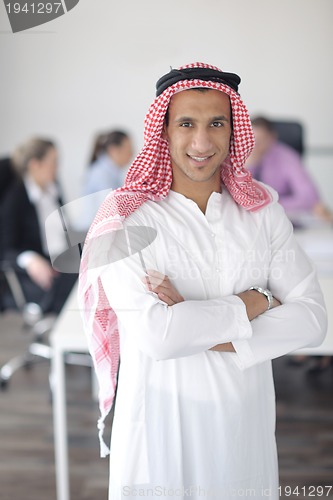 Image of Arabic business man at meeting