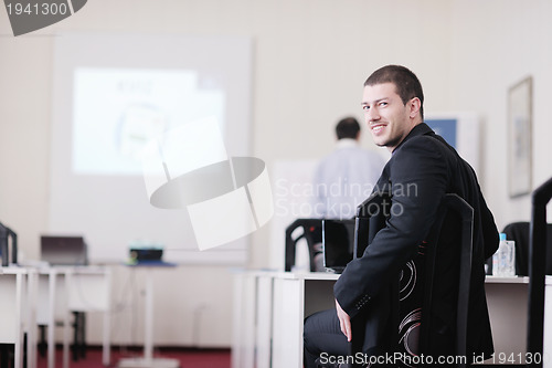 Image of business man on seminar