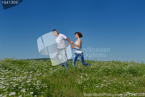 Image of happy couple in wheat field