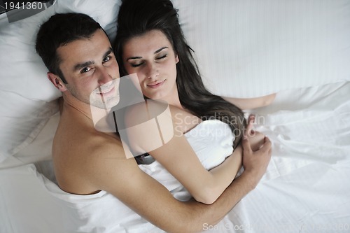 Image of young couple have good time in their bedroom