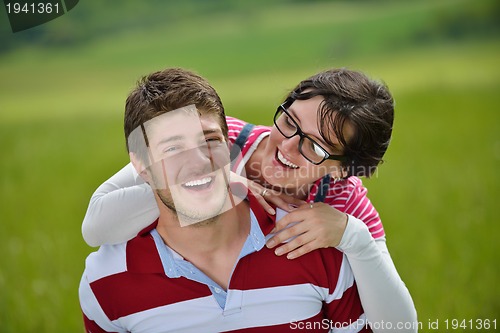 Image of romantic young couple in love together outdoor