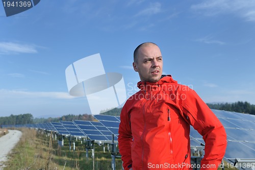 Image of Male solar panel engineer at work place