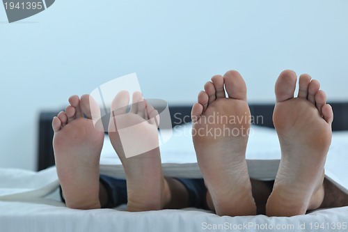 Image of young couple have good time in their bedroom