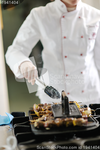 Image of chef preparing meal