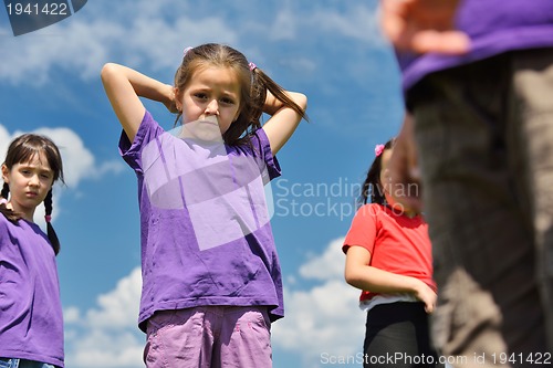Image of happy kids group  have fun in nature