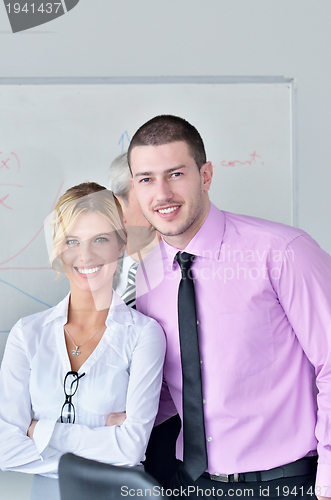 Image of Group of young business people at meeting