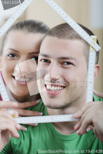 Image of Young couple moving in new house