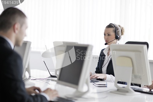 Image of business people group working in customer and help desk office