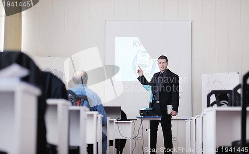 Image of business man on seminar