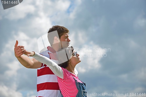 Image of romantic young couple in love together outdoor