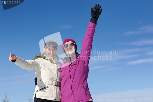 Image of winter season fun with group of girls