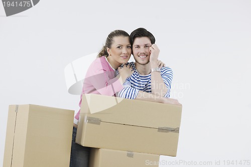 Image of Young couple moving in new home