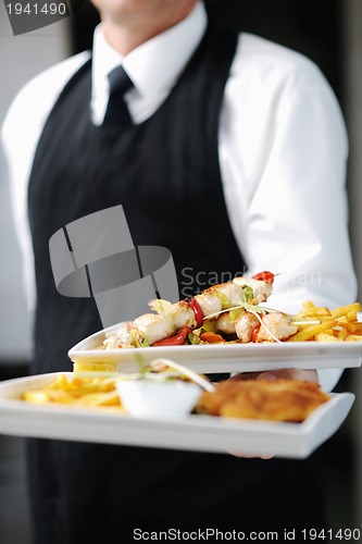 Image of chef preparing meal