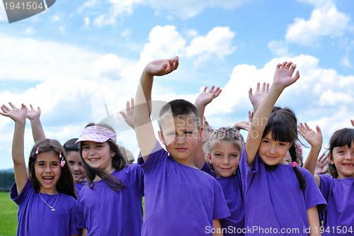 Image of happy kids group  have fun in nature