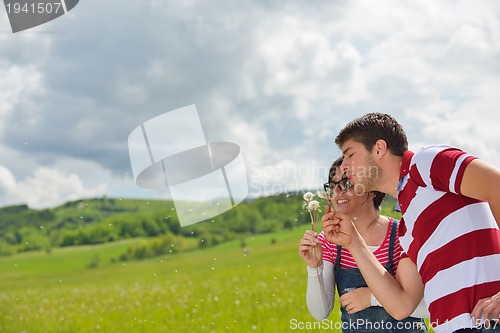 Image of romantic young couple in love together outdoor