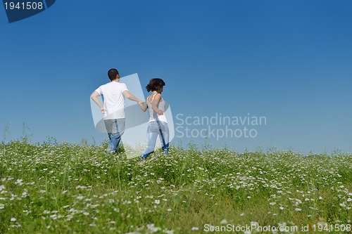 Image of happy couple in wheat field