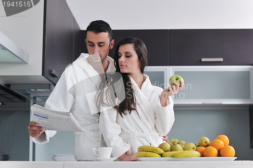 Image of young couple have fun in modern kitchen