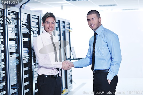 Image of it enineers in network server room