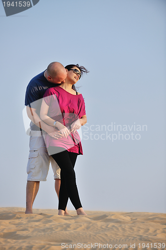 Image of couple enjoying the sunset