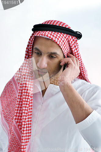 Image of arab business man at bright office