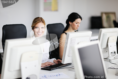 Image of business people group working in customer and help desk office