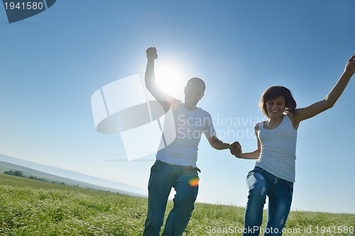 Image of happy couple in wheat field