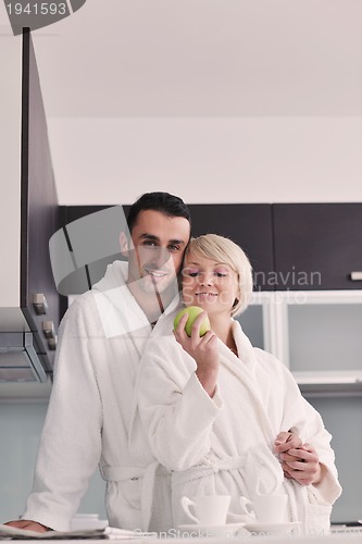 Image of young couple have fun in modern kitchen