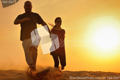 Image of couple enjoying the sunset