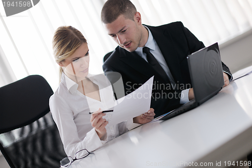 Image of business people in a meeting at office