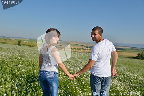 Image of happy couple in wheat field