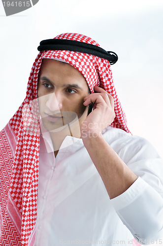 Image of arab business man at bright office